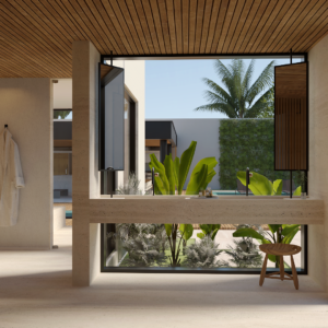 A luz natural e os materiais neutros reforçam a sensação de calma no ambiente.